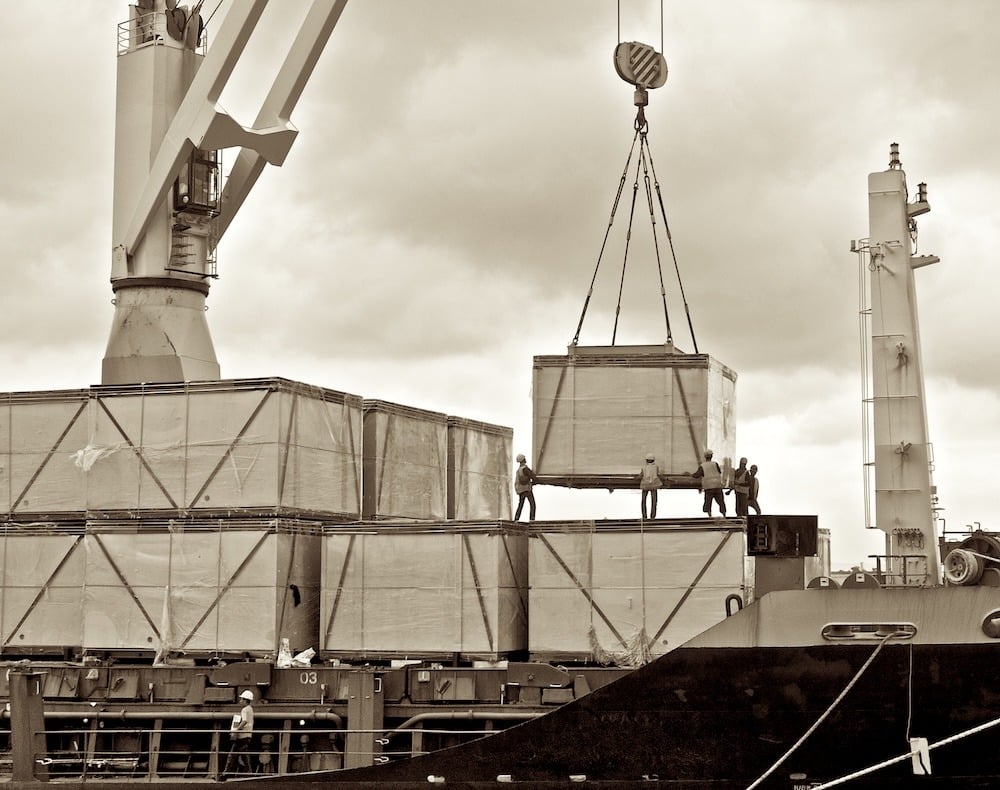 loading-cargo-into-the-ship-in-port-shipyard-2024-09-19-01-26-46-utc